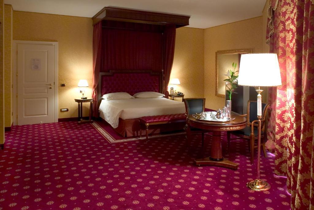 Hotel Maxim Peschiera Borromeo Rum bild