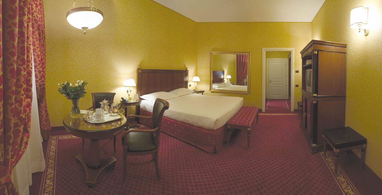 Hotel Maxim Peschiera Borromeo Rum bild